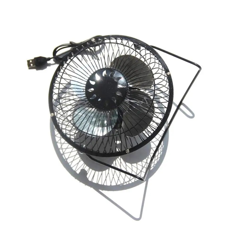 Black USB fan on a white background