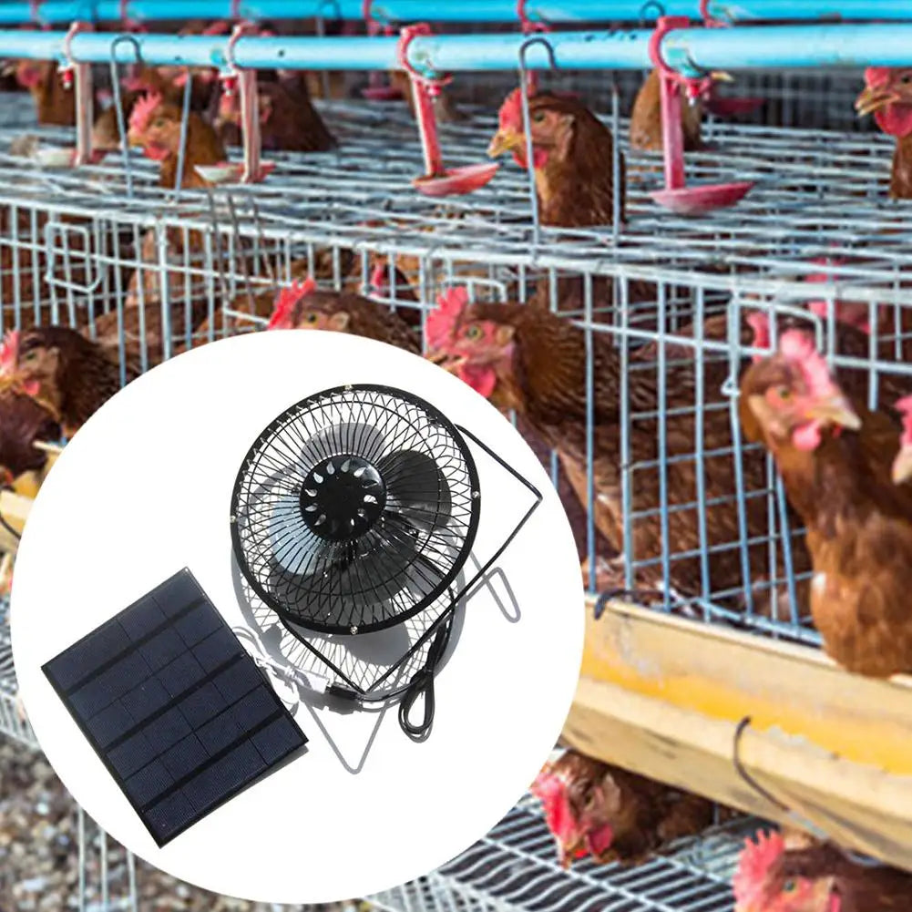 Solar-powered fan for poultry with chickens in a cage